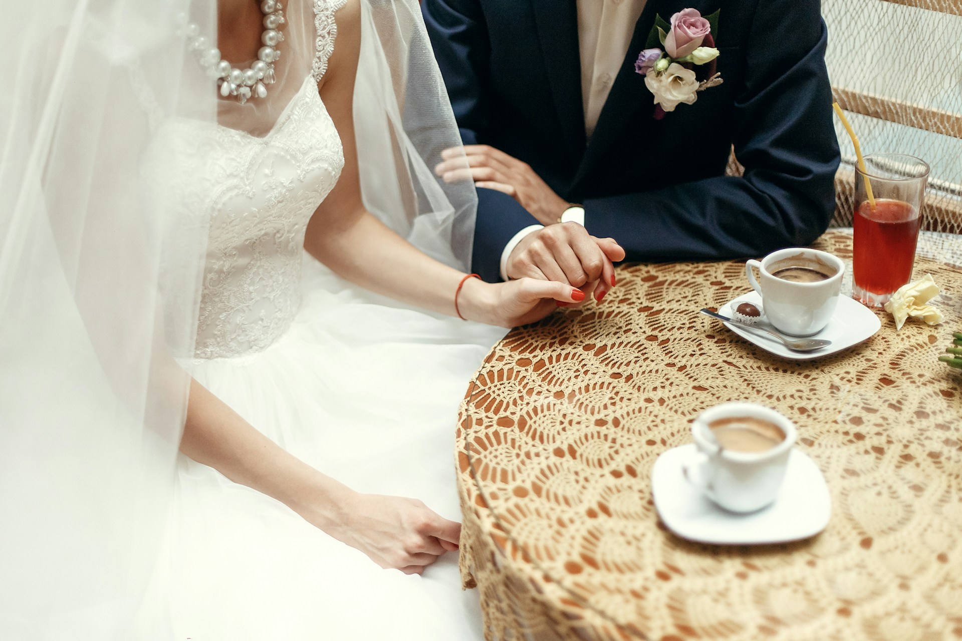bride and groom drinking coffee
